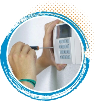 Hand installing a thermostat on a wall, using a screwdriver, illustrating HVAC installation services offered by Turbo Home Services in the Greater Houston area.