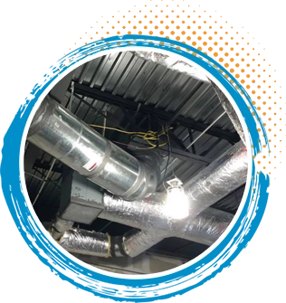 Ductwork and vents installation showcasing metal ducts and ventilation system, emphasizing HVAC repair and maintenance services in residential settings.