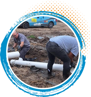 Plumbers repairing residential drainage system in Houston, Texas, with a service vehicle in the background.