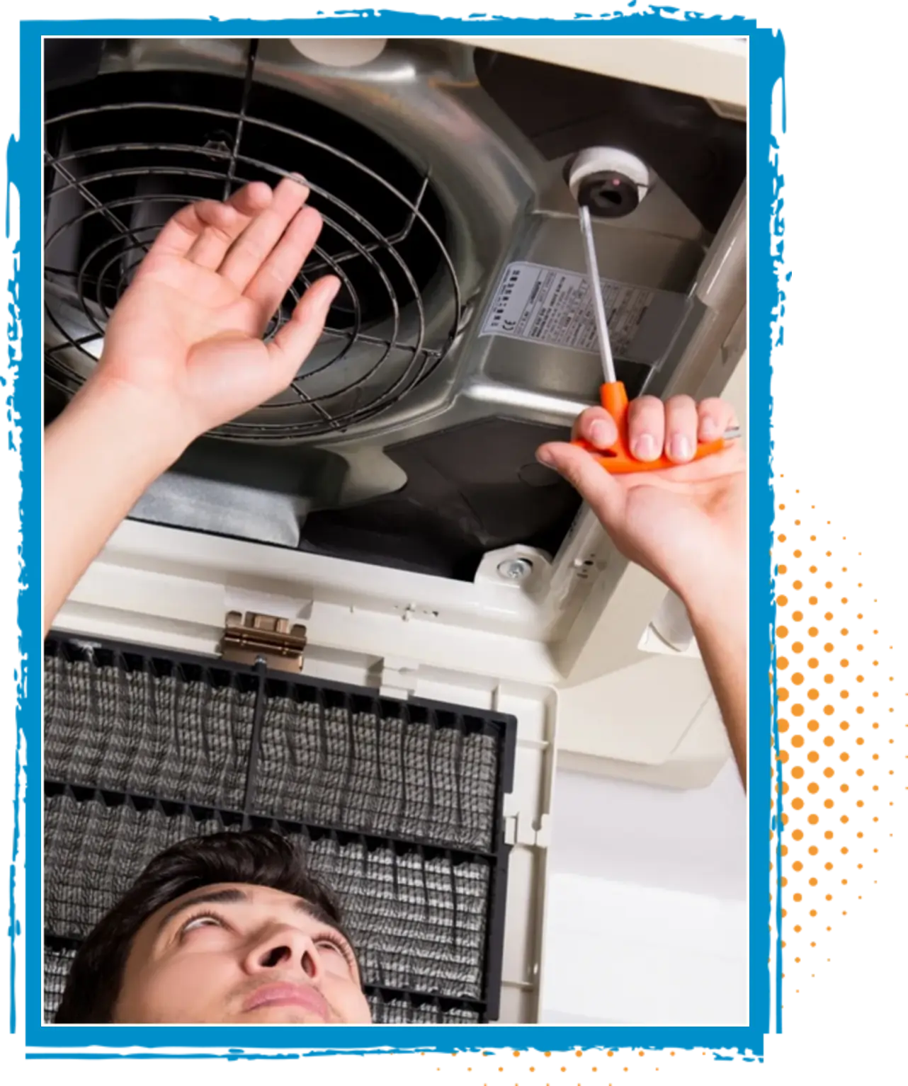 Technician repairing air conditioning unit, focusing on fan and components, showcasing proactive maintenance for improved system performance and efficiency.